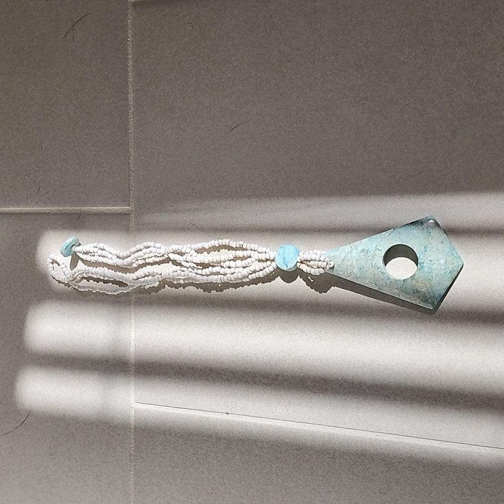Fire and ice quartz necklace. Bought on a cruise. Absolutely gorgeous piece.
